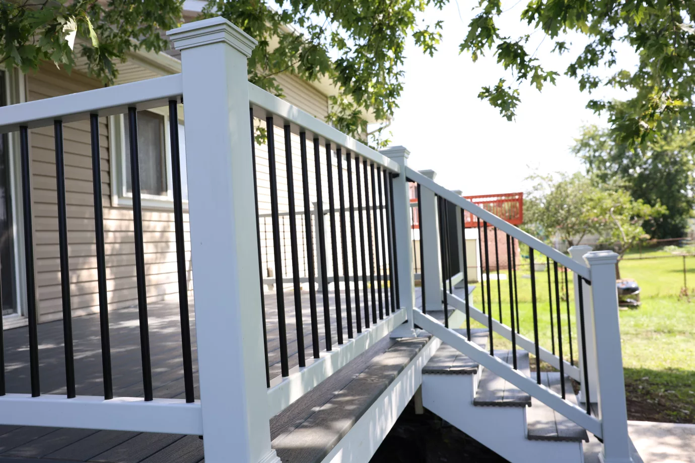 Black aluminum deck railing installed by Osnova Construction